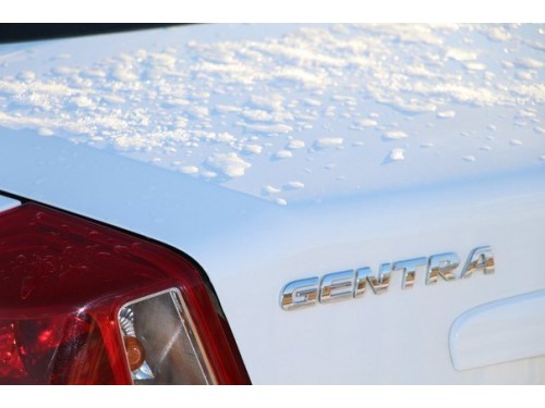 Характеристики автомобиля Daewoo Gentra 1.5 MT 2WD Optimum (07.2013 - 02.2016): фото, вместимость, скорость, двигатель, топливо, масса, отзывы