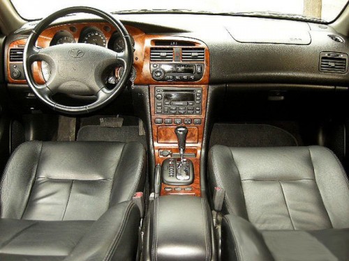 Характеристики автомобиля Daewoo Magnus 2.0 MT (148) (02.2003 - 01.2006): фото, вместимость, скорость, двигатель, топливо, масса, отзывы
