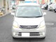 Характеристики автомобиля Daihatsu Move 660 custom R 4WD (05.2010 - 11.2010): фото, вместимость, скорость, двигатель, топливо, масса, отзывы