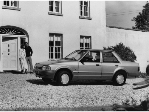 Характеристики автомобиля Ford Orion 1.6 MT Ghia (03.1986 - 08.1990): фото, вместимость, скорость, двигатель, топливо, масса, отзывы