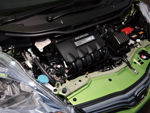 Характеристики автомобиля Honda Fit 1.3 G 10th Anniversary II (10.2011 - 04.2012): фото, вместимость, скорость, двигатель, топливо, масса, отзывы