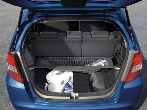 Характеристики автомобиля Honda Jazz 1.4 CVT Si (04.2011 - 08.2015): фото, вместимость, скорость, двигатель, топливо, масса, отзывы
