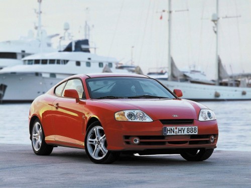 Характеристики автомобиля Hyundai Coupe 2.7 AT GLS (01.2002 - 09.2005): фото, вместимость, скорость, двигатель, топливо, масса, отзывы