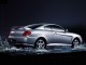 Характеристики автомобиля Hyundai Coupe 2.0 MT GLS (10.2005 - 09.2006): фото, вместимость, скорость, двигатель, топливо, масса, отзывы