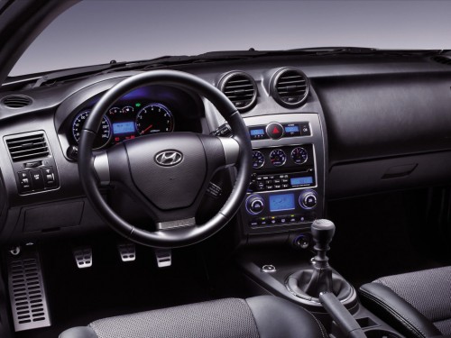 Характеристики автомобиля Hyundai Coupe 2.0 AT GLS (10.2006 - 09.2009): фото, вместимость, скорость, двигатель, топливо, масса, отзывы