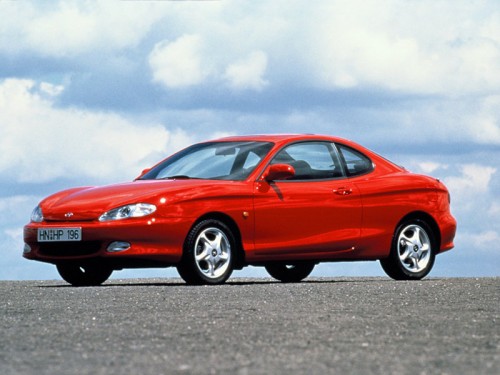 Характеристики автомобиля Hyundai Coupe 2.0 MT FX (01.1996 - 09.1999): фото, вместимость, скорость, двигатель, топливо, масса, отзывы