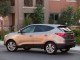 Характеристики автомобиля Hyundai Tucson 2.4 AT 4x4 GLS (01.2011 - 09.2013): фото, вместимость, скорость, двигатель, топливо, масса, отзывы