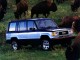 Характеристики автомобиля Isuzu Trooper 2.6 MT LS (01.1987 - 12.1991): фото, вместимость, скорость, двигатель, топливо, масса, отзывы