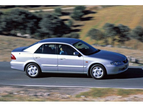 Характеристики автомобиля Mazda 626 1.8 MT Exclusive (01.2000 - 08.2002): фото, вместимость, скорость, двигатель, топливо, масса, отзывы