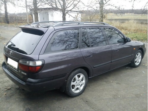 Характеристики автомобиля Mazda 626 2.0 MT (04.1997 - 12.1999): фото, вместимость, скорость, двигатель, топливо, масса, отзывы