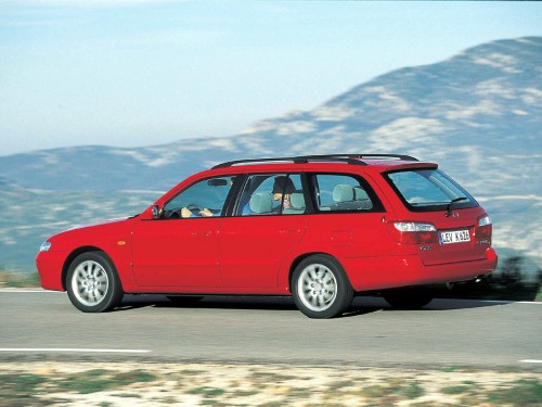 Характеристики автомобиля Mazda 626 1.8 MT Exclusive (01.2000 - 08.2002): фото, вместимость, скорость, двигатель, топливо, масса, отзывы