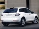 Характеристики автомобиля Mazda CX-7 2.3 cruising package 4WD (09.2009 - 01.2012): фото, вместимость, скорость, двигатель, топливо, масса, отзывы