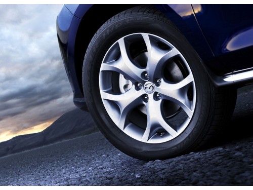 Характеристики автомобиля Mazda CX-7 2.3 MZR DISI AT Touring (05.2010 - 08.2012): фото, вместимость, скорость, двигатель, топливо, масса, отзывы