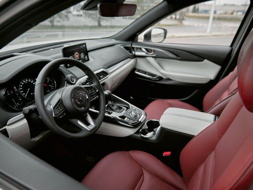 Характеристики автомобиля Mazda CX-9 2.5T AT High (02.2021 - н.в.): фото, вместимость, скорость, двигатель, топливо, масса, отзывы