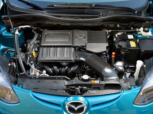 Характеристики автомобиля Mazda Mazda2 1.5 MZR AT Center-Line 5dr. (11.2010 - 10.2014): фото, вместимость, скорость, двигатель, топливо, масса, отзывы