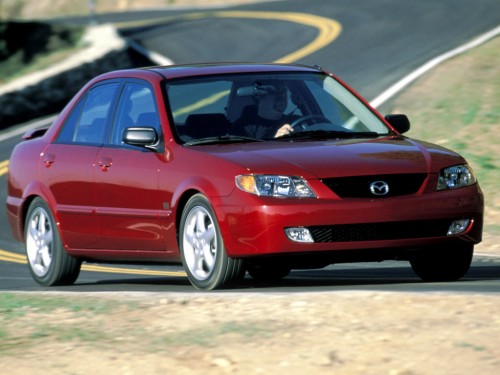 Характеристики автомобиля Mazda Protege 2.0 MT MP3 (05.2001 - 09.2001): фото, вместимость, скорость, двигатель, топливо, масса, отзывы