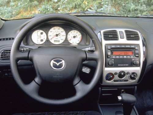 Характеристики автомобиля Mazda Protege 2.0 MT ES (04.2000 - 09.2003): фото, вместимость, скорость, двигатель, топливо, масса, отзывы