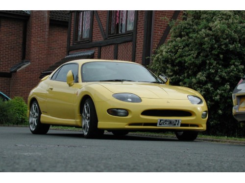 Характеристики автомобиля Mitsubishi FTO 2.0 GR Sport package (02.1996 - 01.1997): фото, вместимость, скорость, двигатель, топливо, масса, отзывы