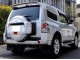 Характеристики автомобиля Mitsubishi Montero 3.2 DI-D MT (10.2011 - 01.2014): фото, вместимость, скорость, двигатель, топливо, масса, отзывы