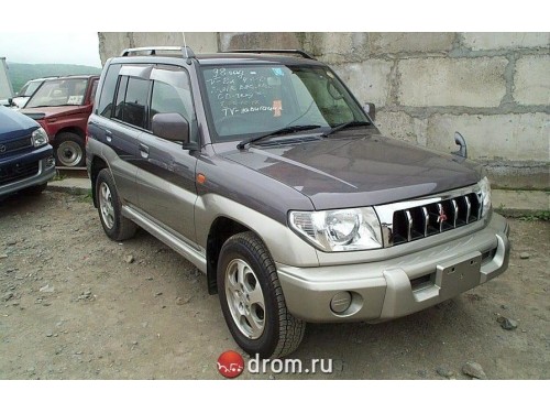 Характеристики автомобиля Mitsubishi Pajero iO 1.8 ZR 4WD (10.1998 - 07.1999): фото, вместимость, скорость, двигатель, топливо, масса, отзывы