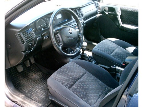 Характеристики автомобиля Opel Vectra 2.5 MT CDX (11.1995 - 05.2000): фото, вместимость, скорость, двигатель, топливо, масса, отзывы