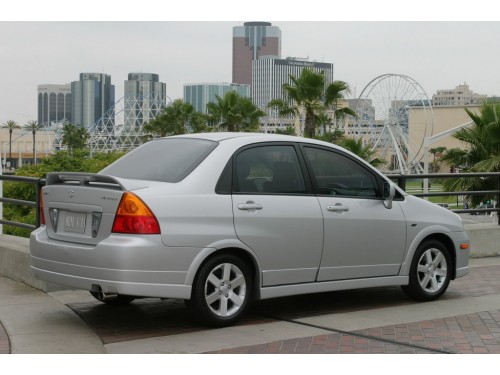 Характеристики автомобиля Suzuki Aerio 2.3 AT Aerio Premium (09.2004 - 09.2007): фото, вместимость, скорость, двигатель, топливо, масса, отзывы