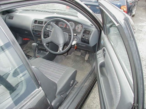 Характеристики автомобиля Toyota Corolla FX 1.6 GT super strut suspension (05.1994 - 04.1995): фото, вместимость, скорость, двигатель, топливо, масса, отзывы