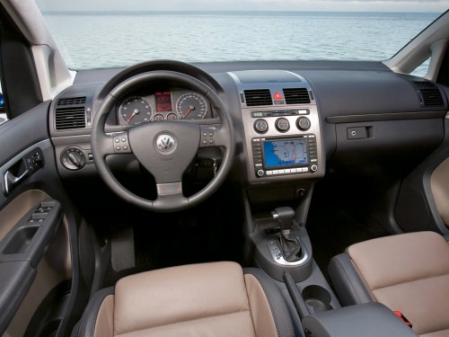 Характеристики автомобиля Volkswagen Touran 1.4 TSI DSG Conceptline 7 мест (02.2006 - 03.2009): фото, вместимость, скорость, двигатель, топливо, масса, отзывы